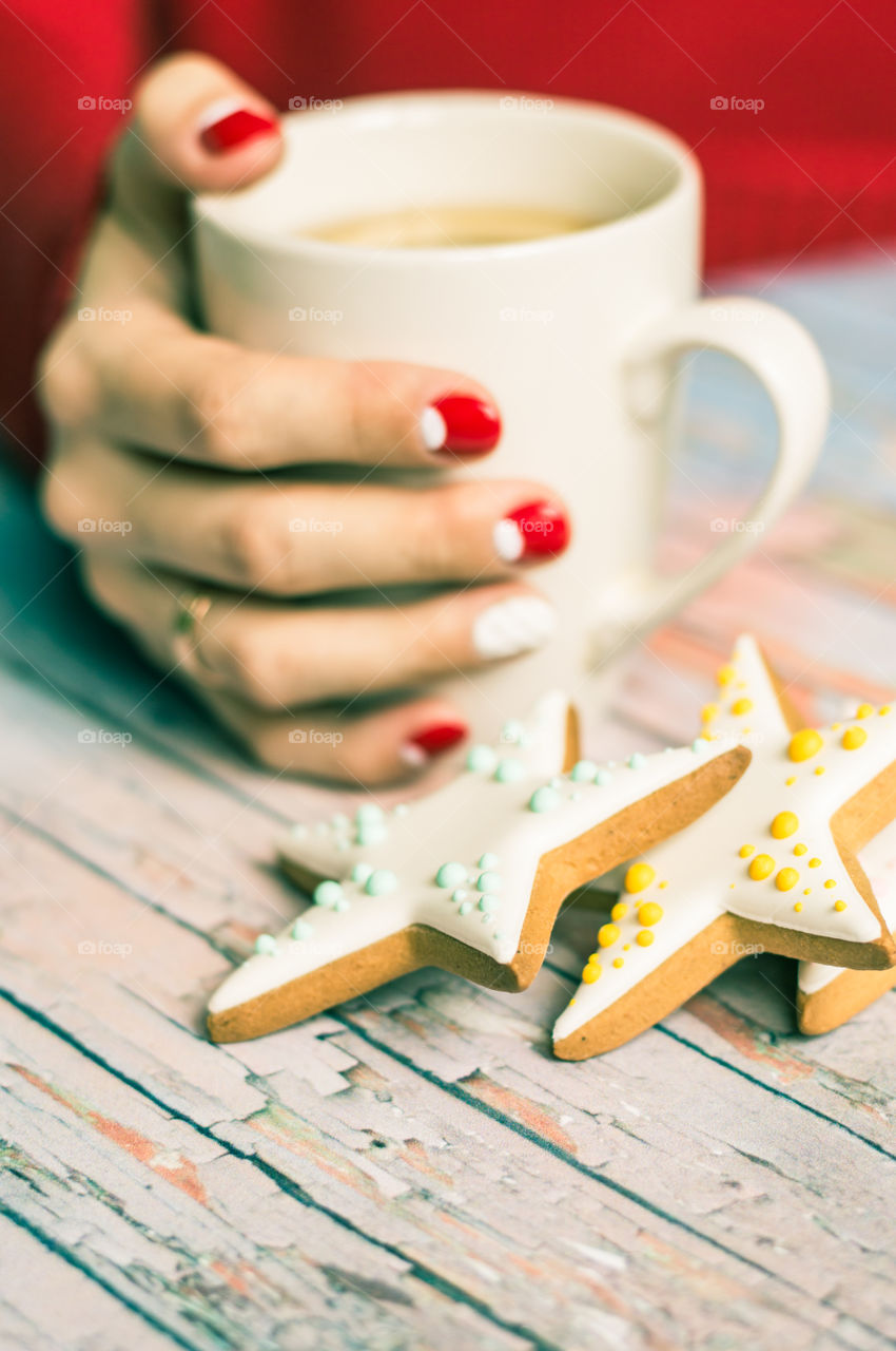 woman hand with cup of tea