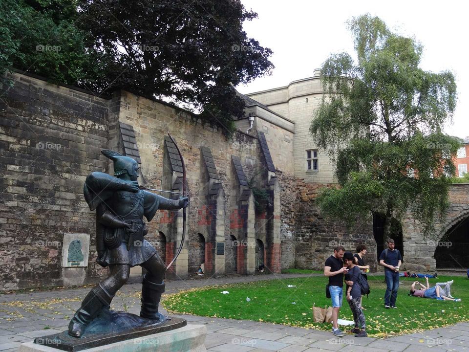 Statue of  Legendary Robin Hood the famous archer outside Nottingham castle, Nottingham, England, UK