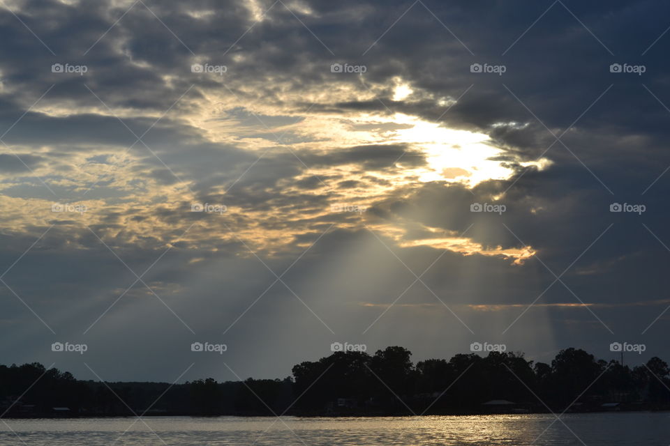 Clouds and Sun. Soft sunlight through the clouds just before sunset 
