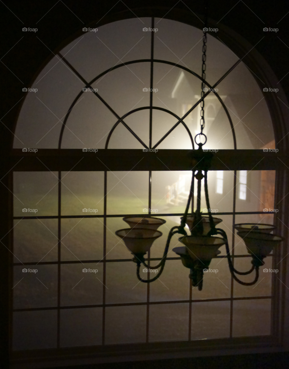 house chandelier foggy night front window by delvec