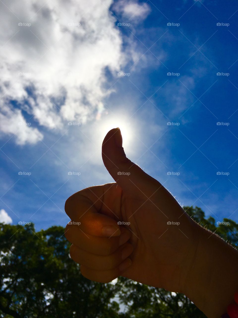 Thumbs up on a beautiful day!