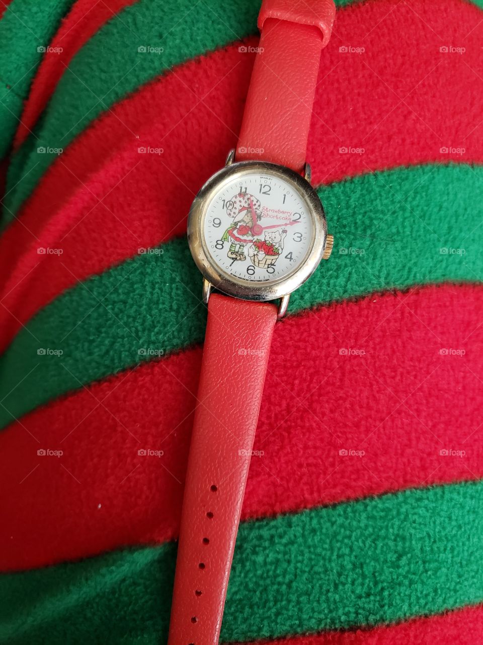 oh my, it's my strawberry shortcake watch from my 10th birthday.. so excited I found this gem. Merry Christmas and Happy New Year!!