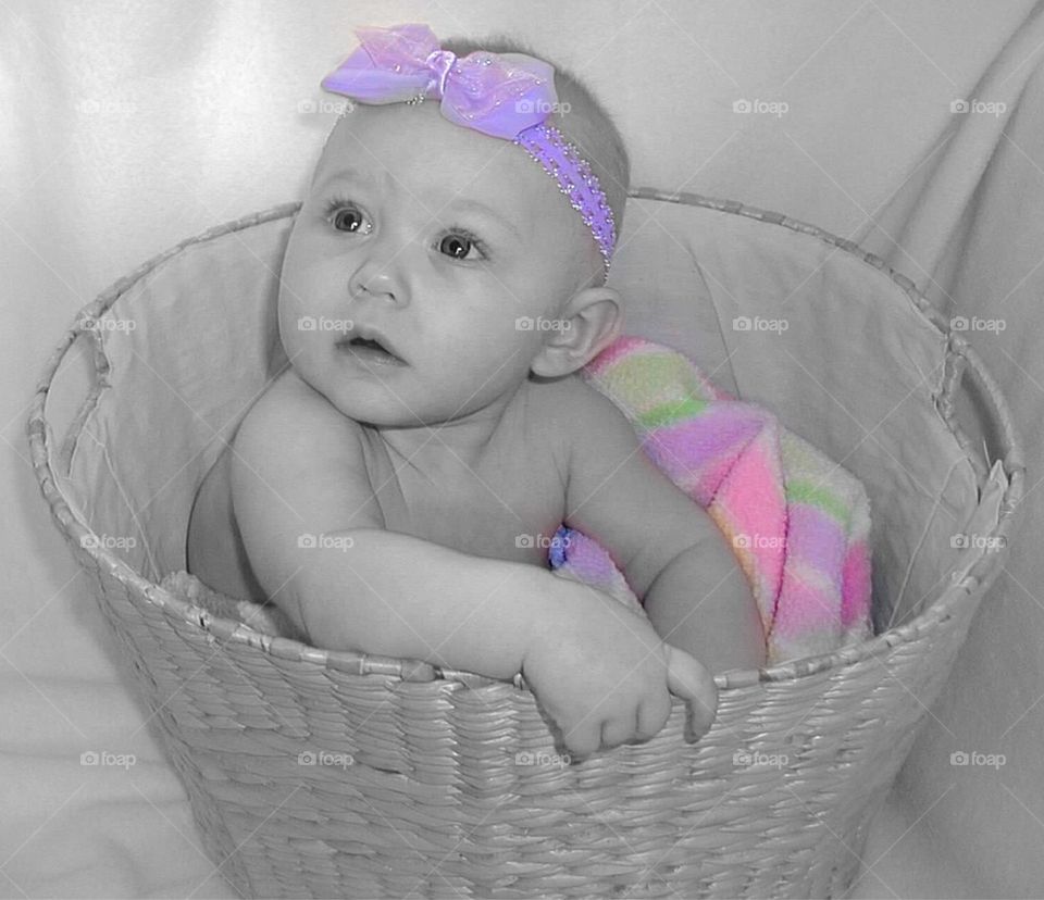 Cute baby in basket