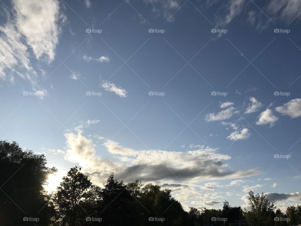 Beautiful lightly cloudy sunny blue sky