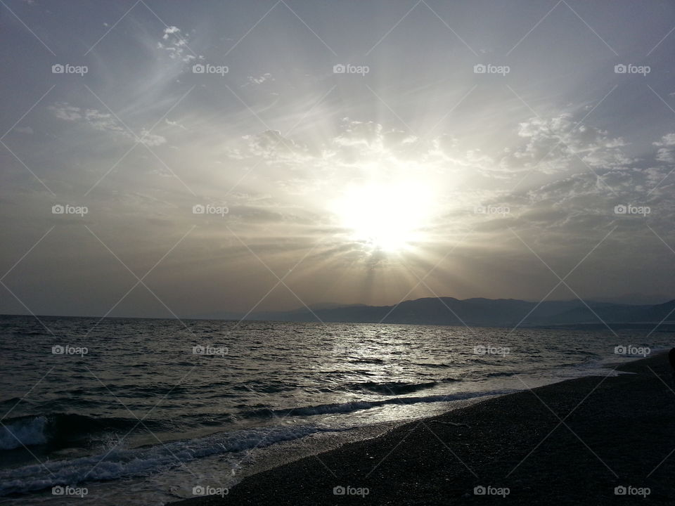 Sunset on virgin beach of Balerma, Almeria.Spain.