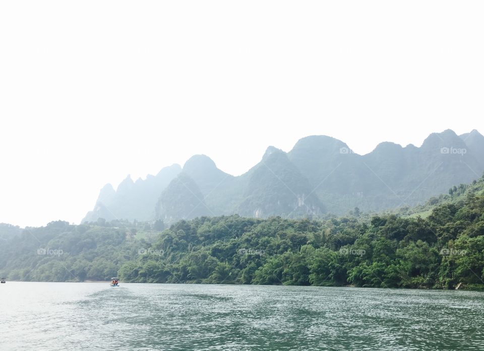 The mountains and waters of Guilin are the finest under heaven.
