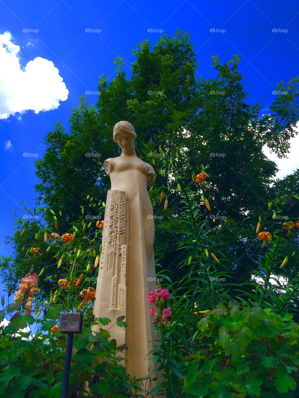 Taliesin Yard Statue . Statue in Frank Lloyd Wright property . 