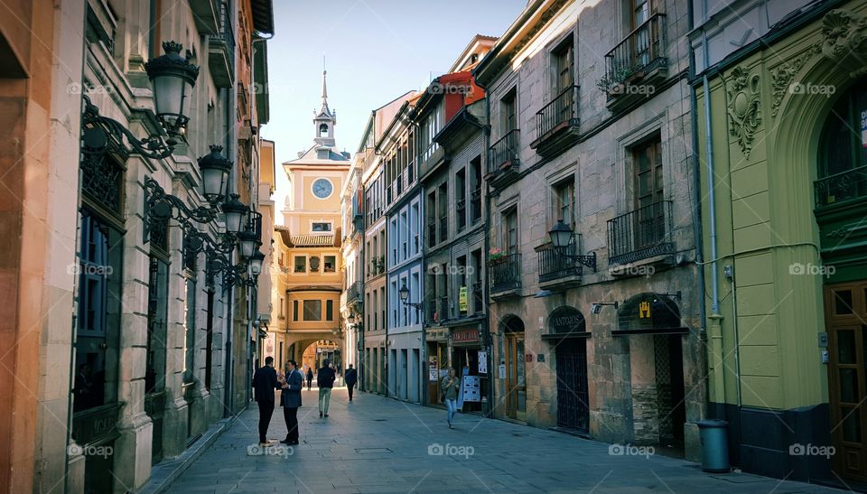 Cimadevilla Street with the tower of Oviedo City Hall in the background.