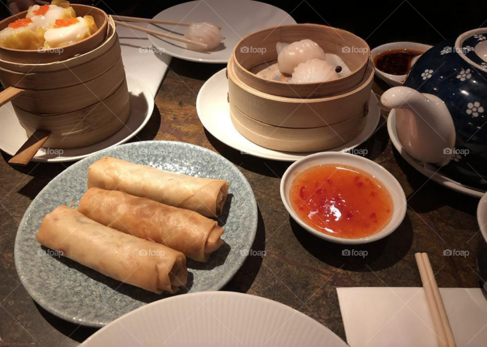 Chinese assorted dim sum dinner including spring rolls, buns and dumplings, steamer basket, Asian cuisine, Cantonese cuisine, Chinese cuisine 