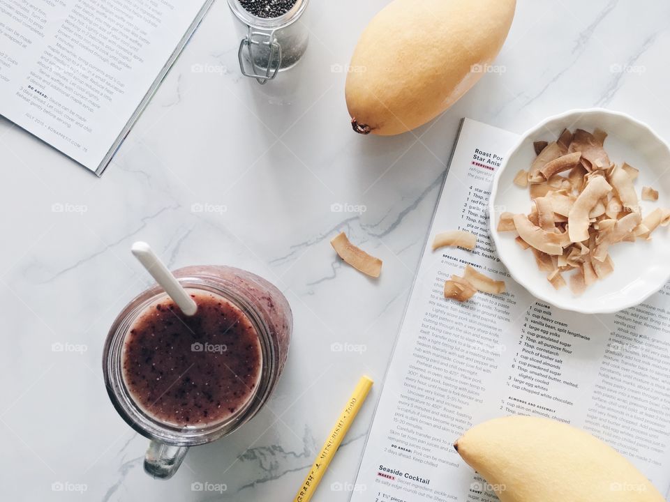 Fresh Fruit Smoothie : Mango blueberry smoothie with coconut chips.