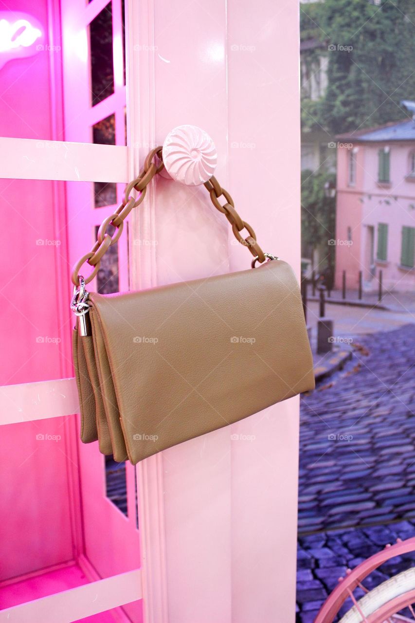 Who left the bag? Obviously, prettiest blonde in the world - Barbie. She left her accessory to call the Ken, lucky man!