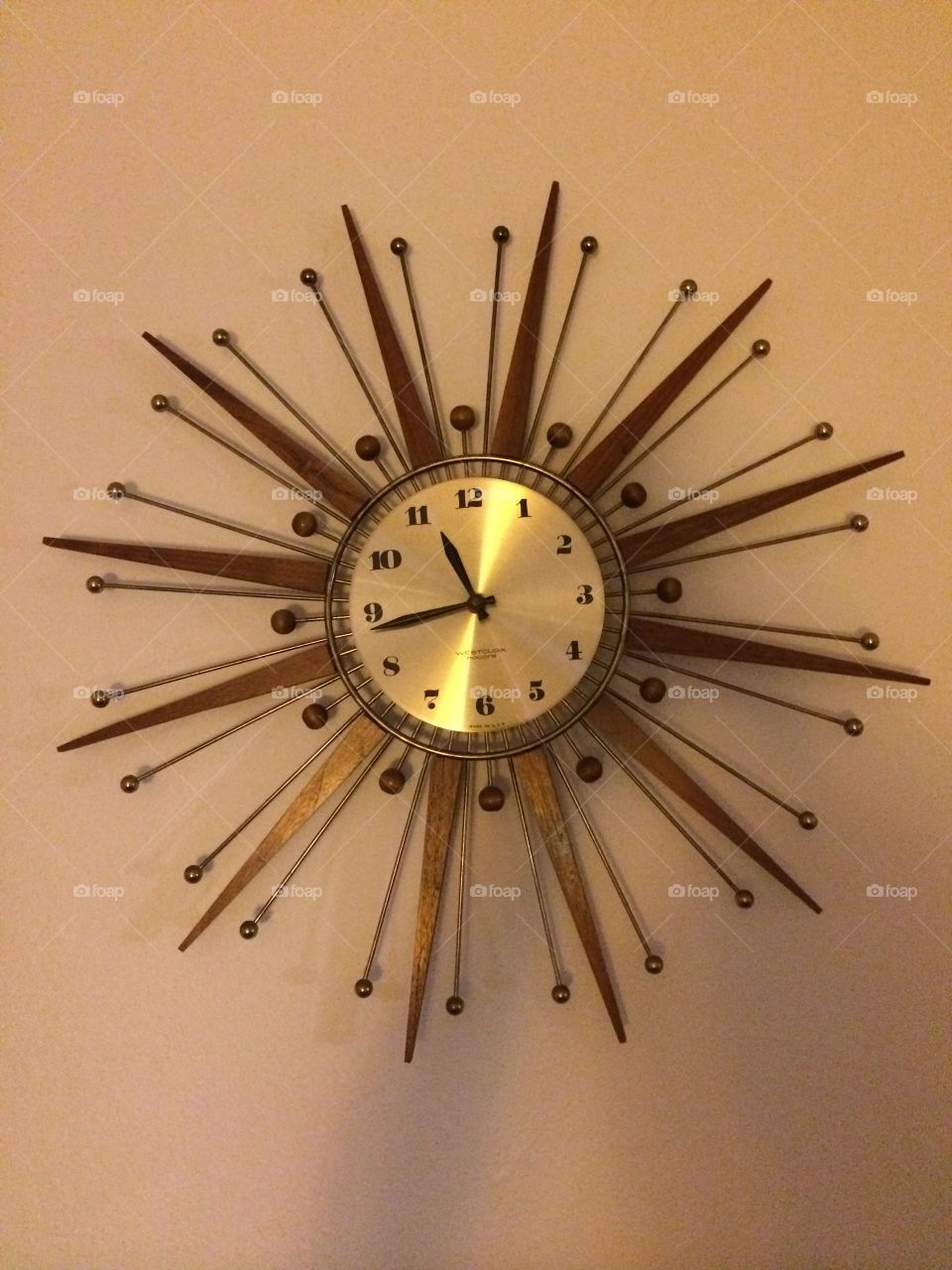 Sunburst clock. Vintage 1970's wall clock