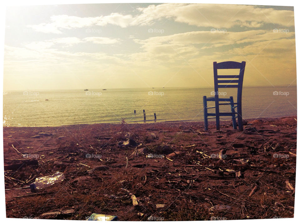 sky chair water seaside by portokalis