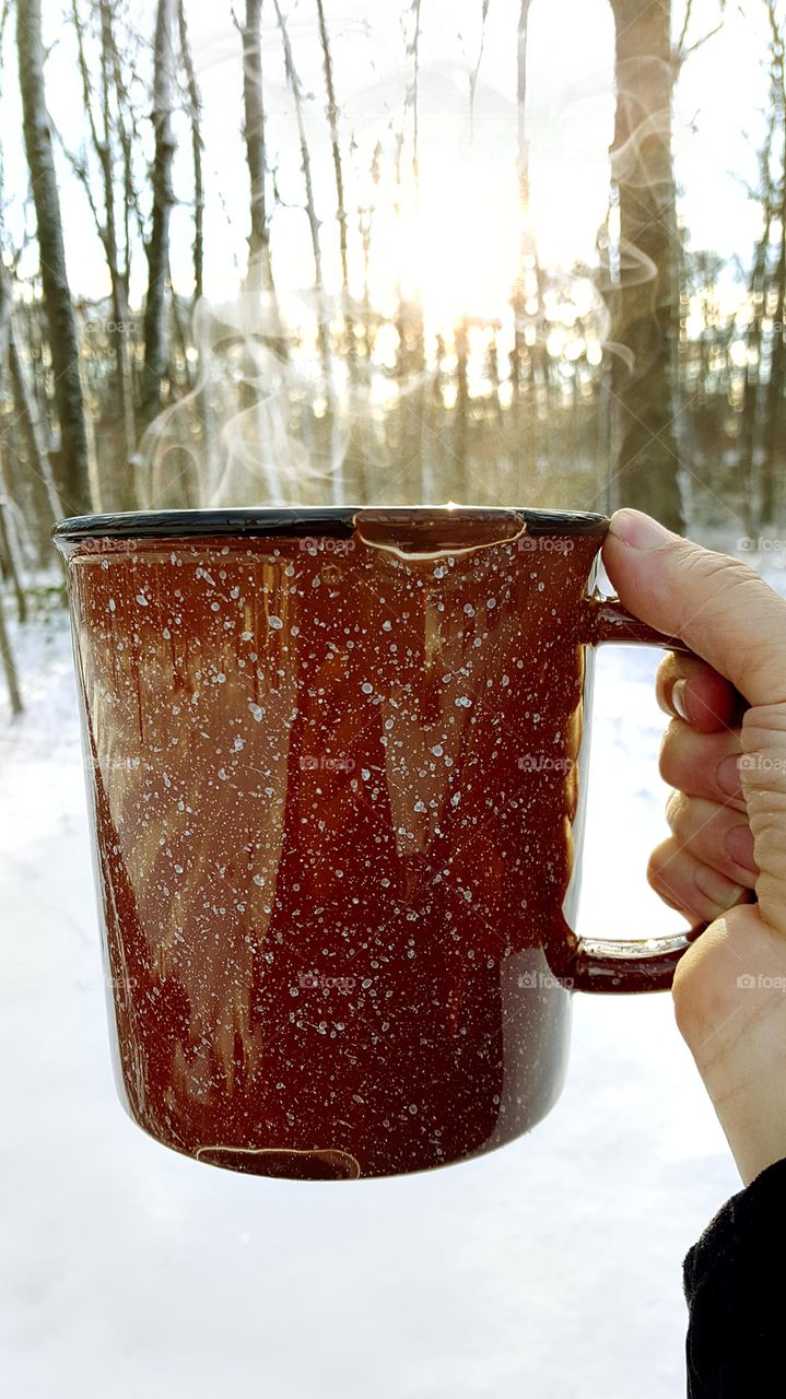 keeping warm on a cold winter day with a nice steamy hot of cocoa or tea.