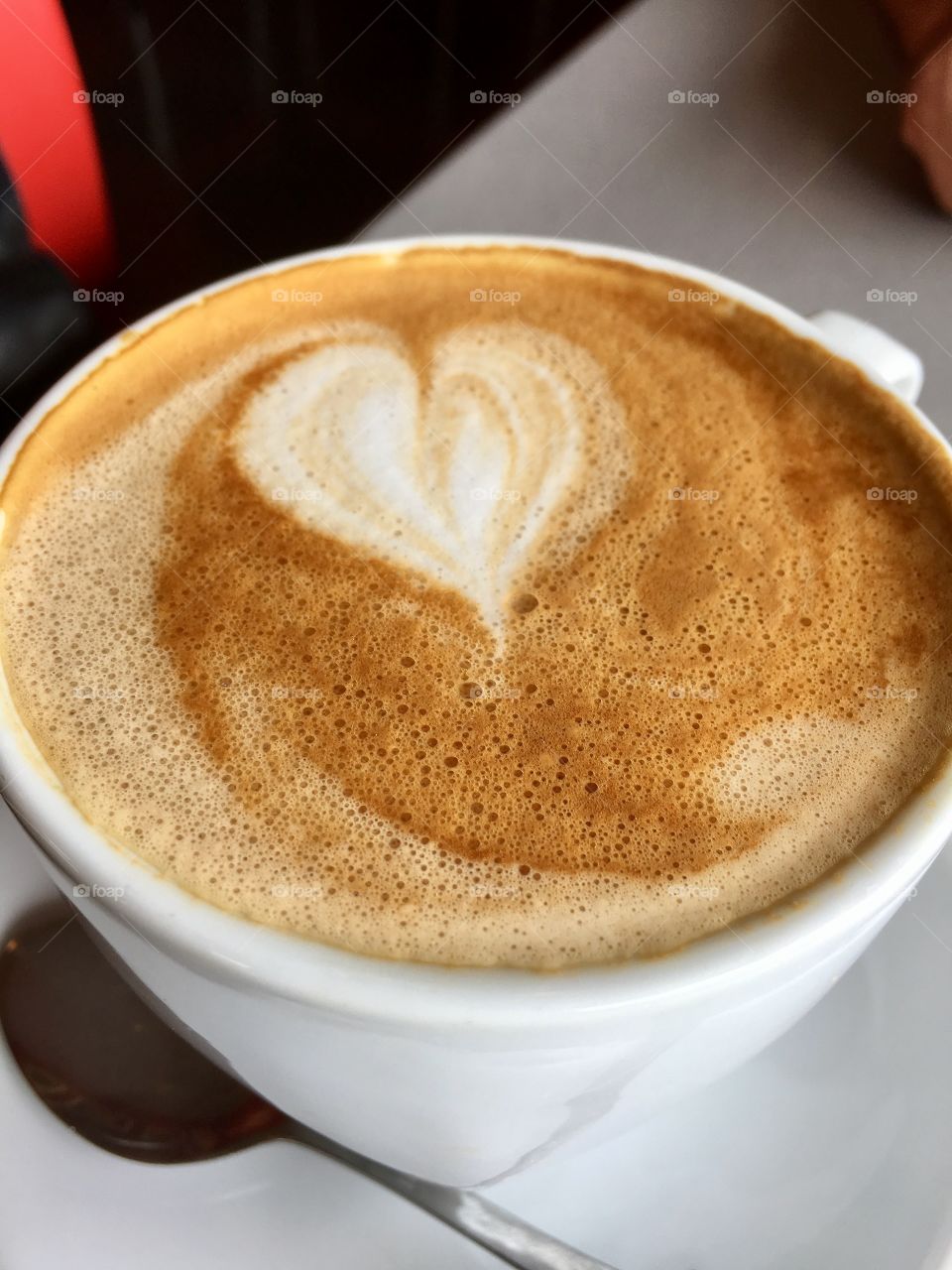 Will you love me forever? Heart shape in foam in coffee Cafe latte 