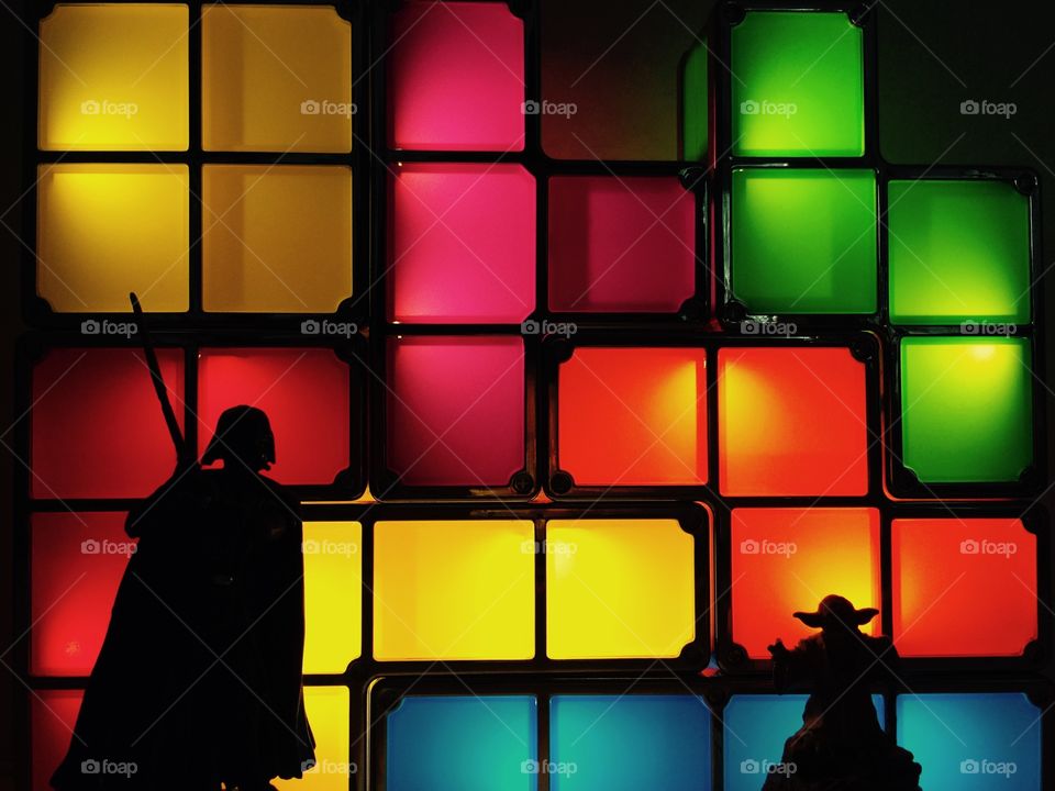 Tetris wars. Star Wars figures on highlighted tetris bricks backgrownd
