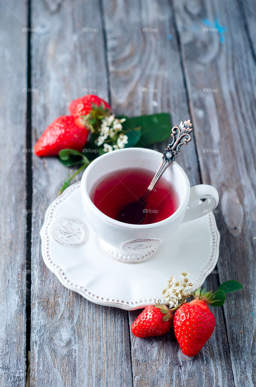 Strawberry herbal tea on table
