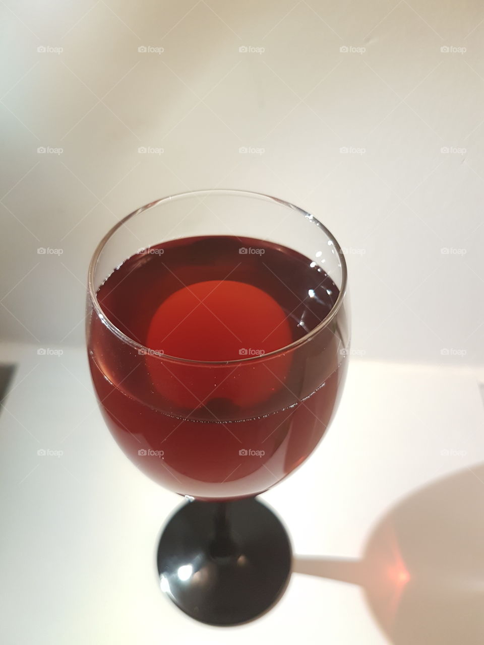 a glass of res wine