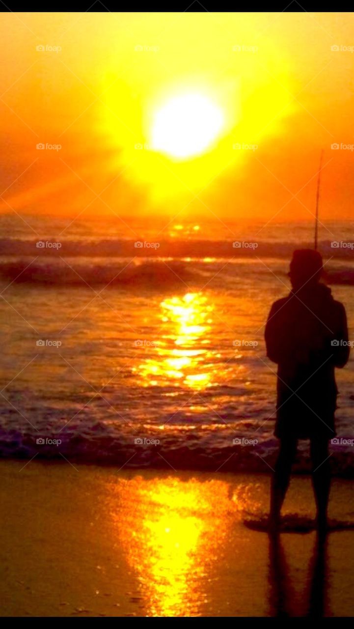 Fishing with a sunrise 
