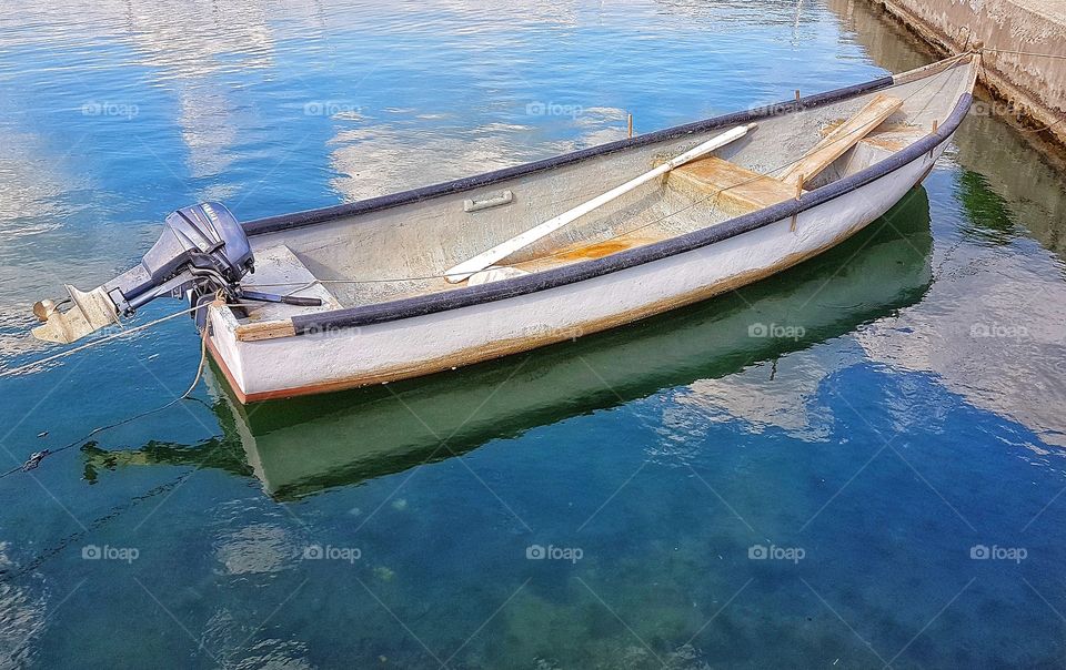 Anchored boat.