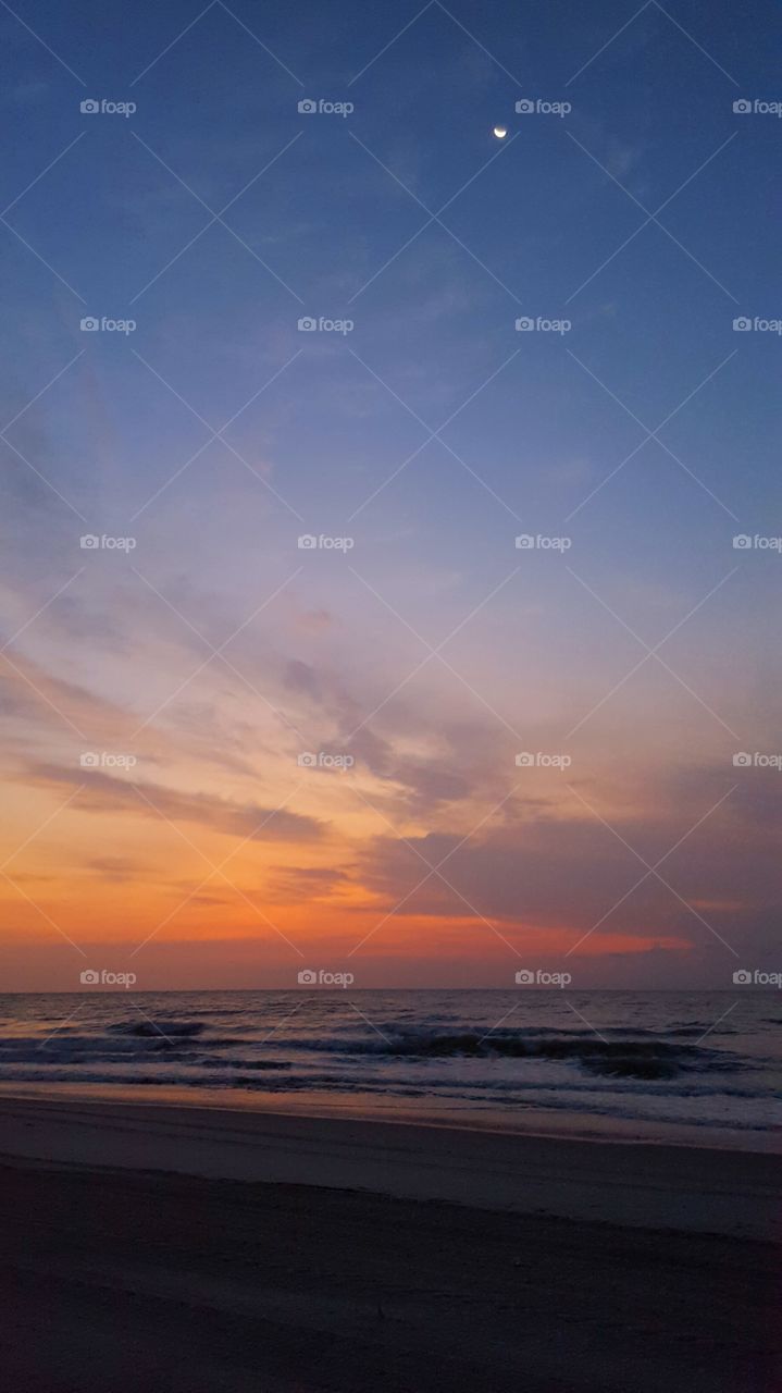 View of beach during sunset