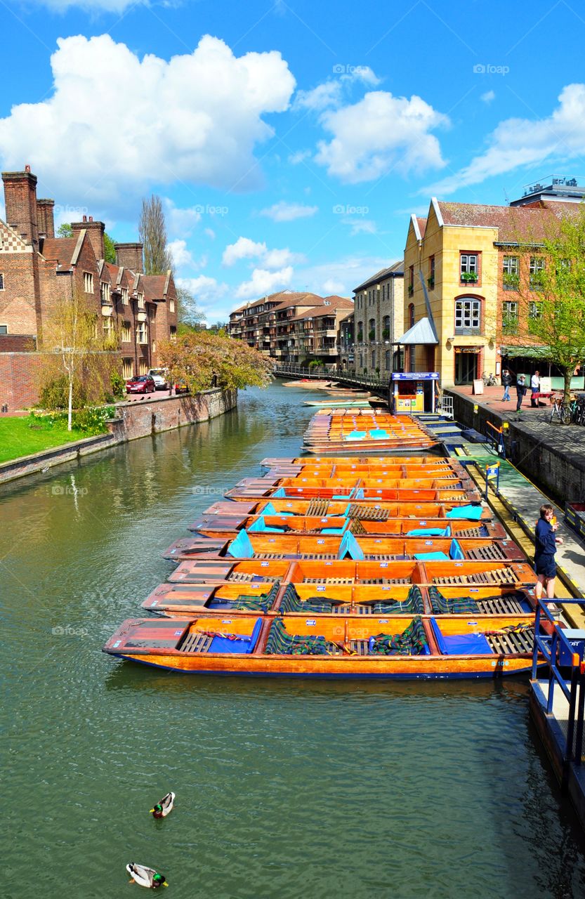 orange punting boats in cambridge