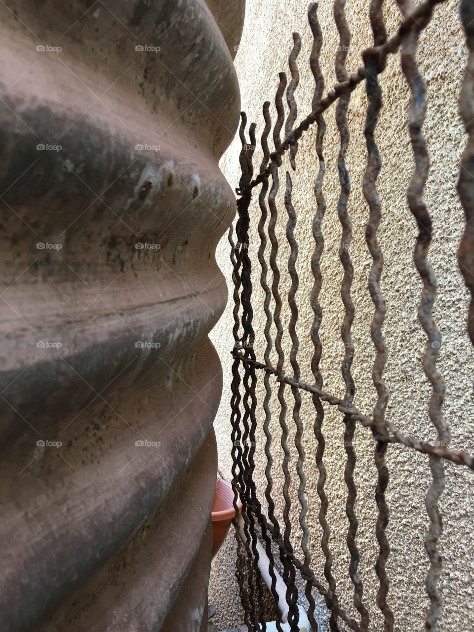 Old galvanised tank and old rusted barbed wire background image