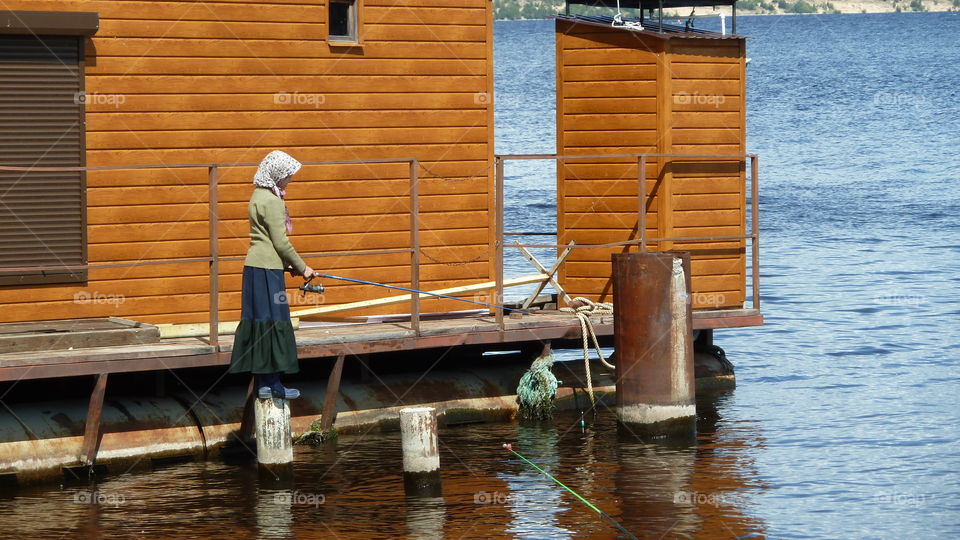 girl with a fishing rod