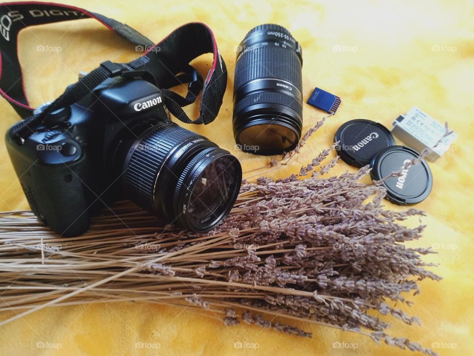 Camera in photography is a device for recording an image of an object on a light-sensitive surface, it is essentially a light-tight box with an aperture to admit light focused onto a sensitized film or plate to capture