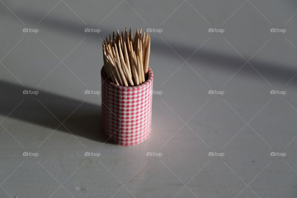 Toothpicks against grey backgrounds