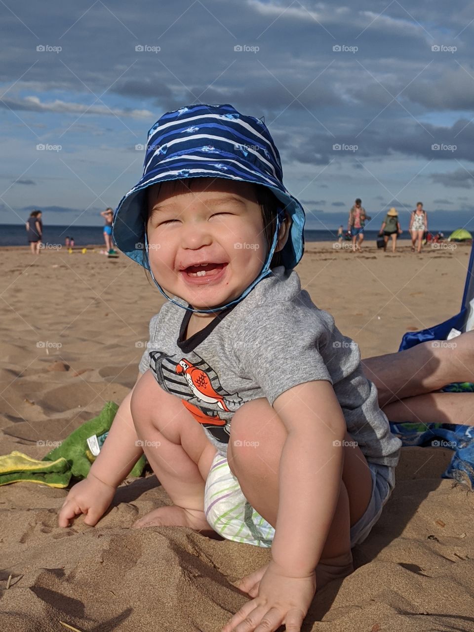 Happy baby at the beach