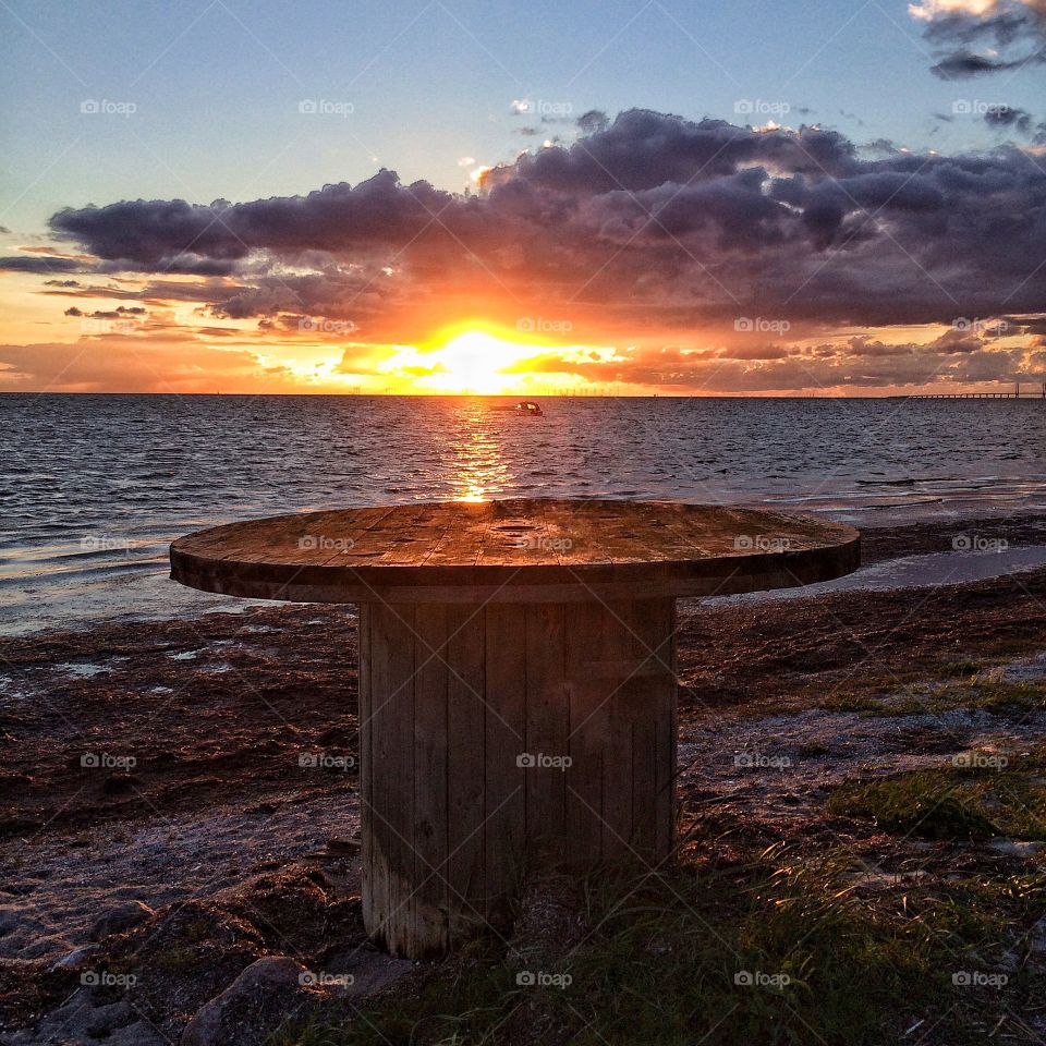Cable reel in sunset