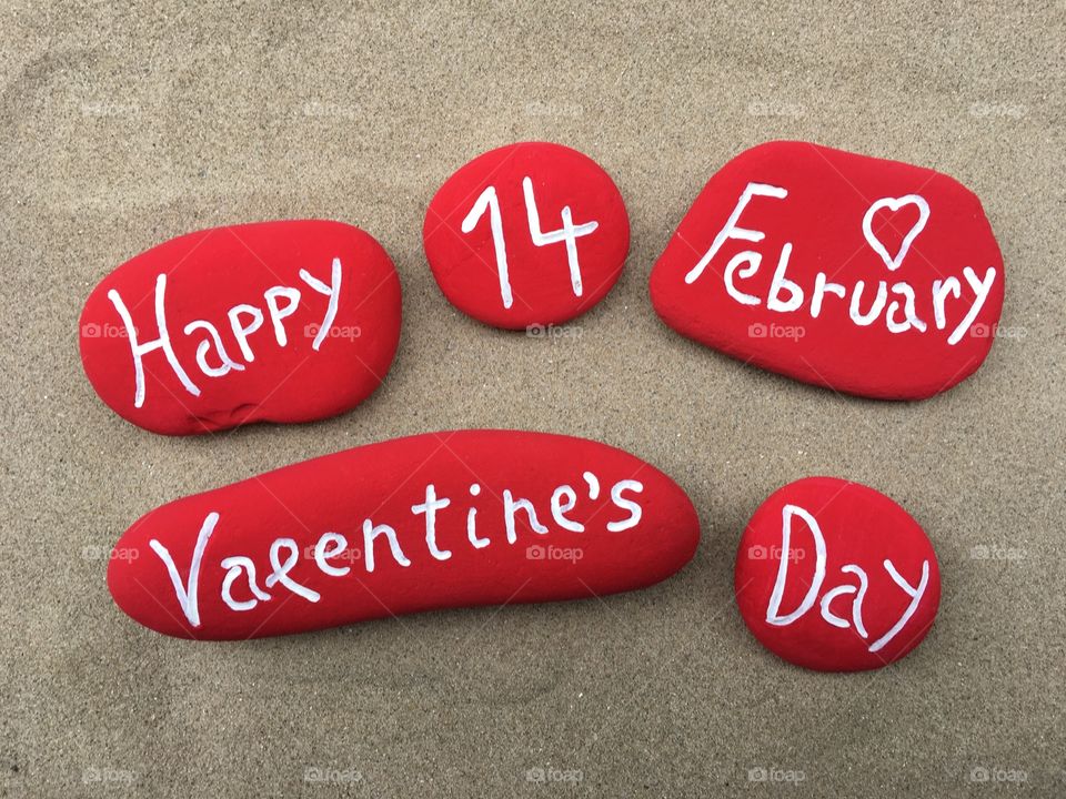 Happy valentine's day text on red stone