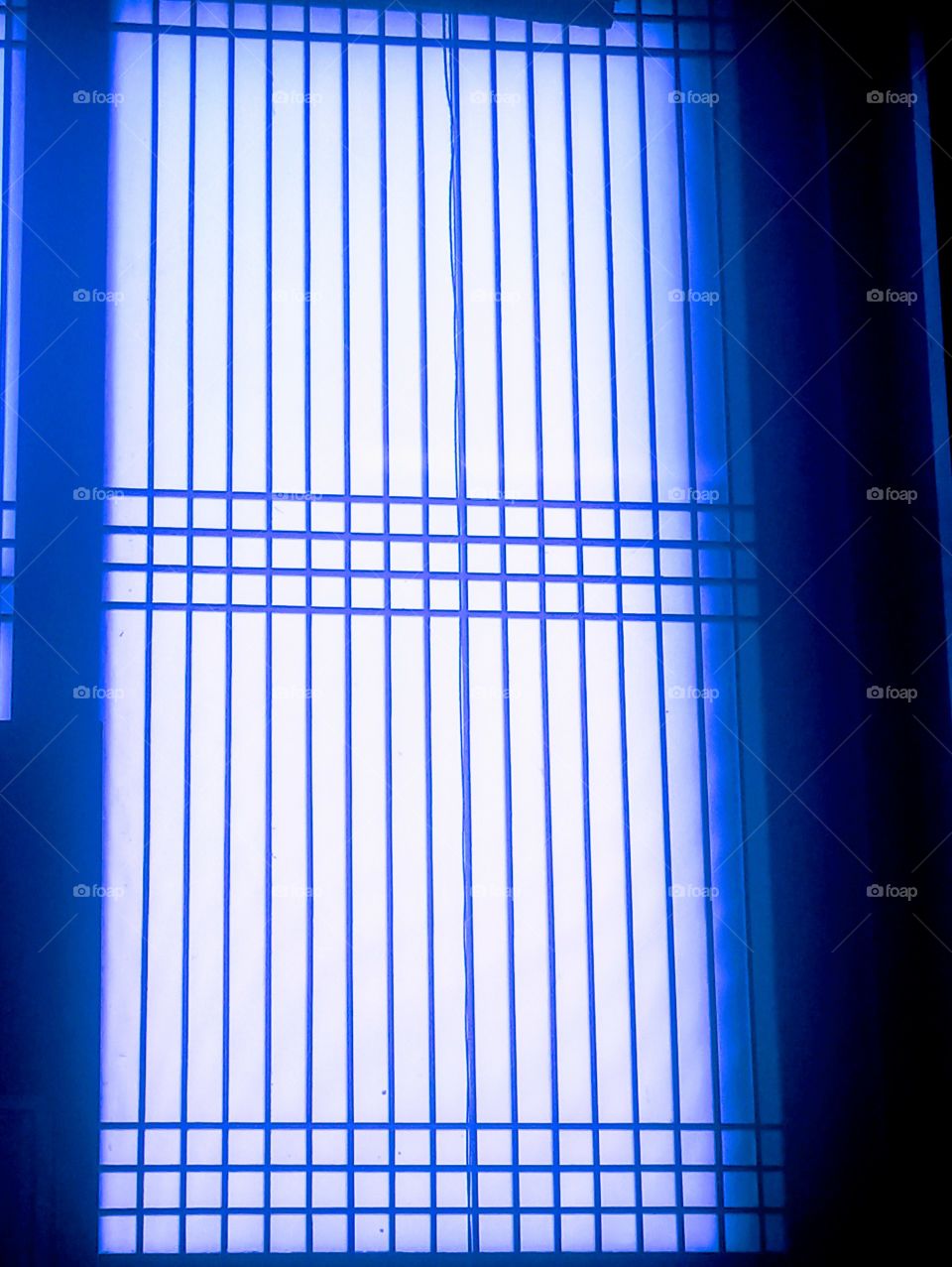 The straight, horizontal &vertical lines, the square shape in the middle and the rectangular shape in the outer edge of the windows in our room.