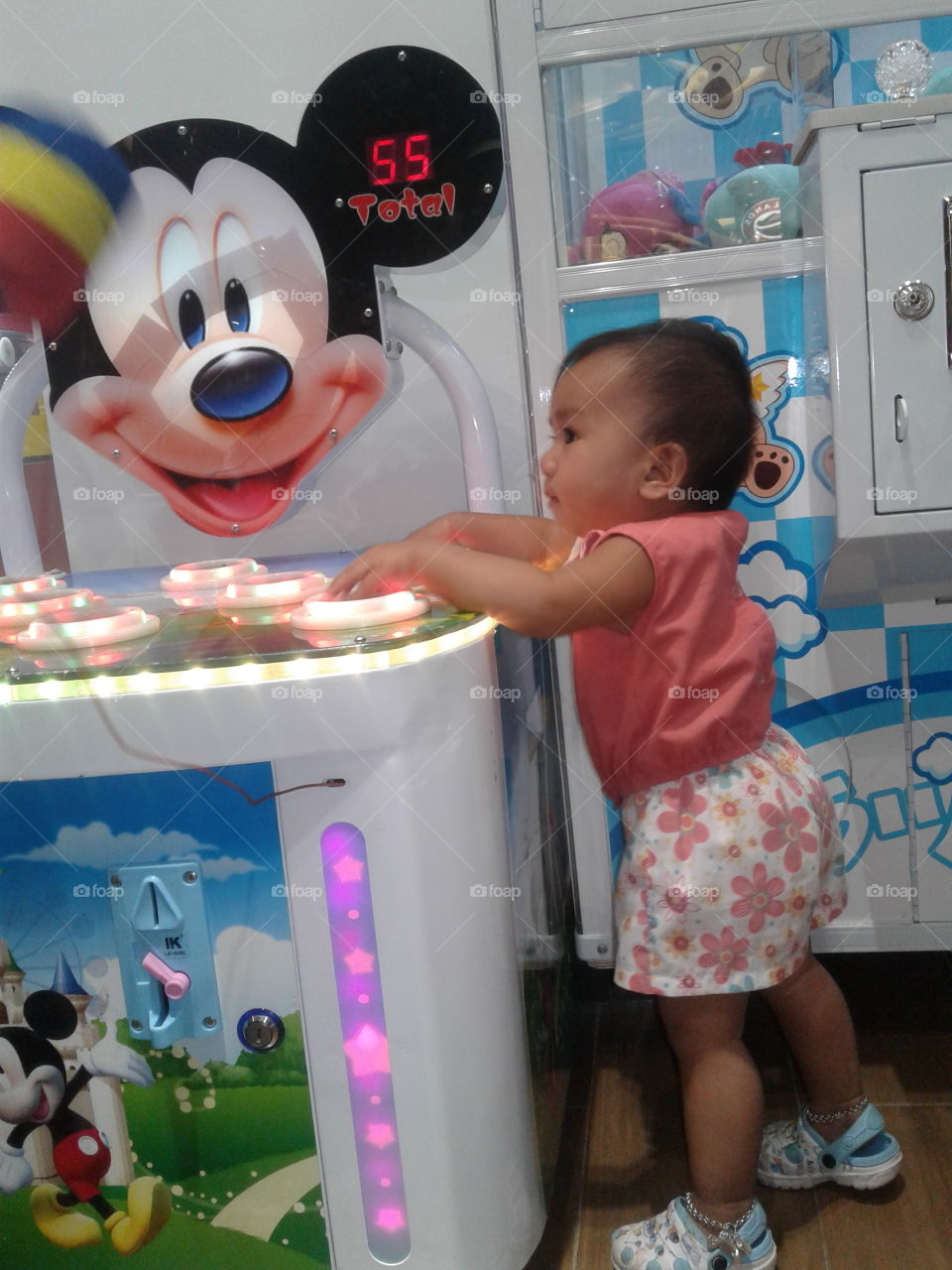 cute baby 
wants to play mickey mouse