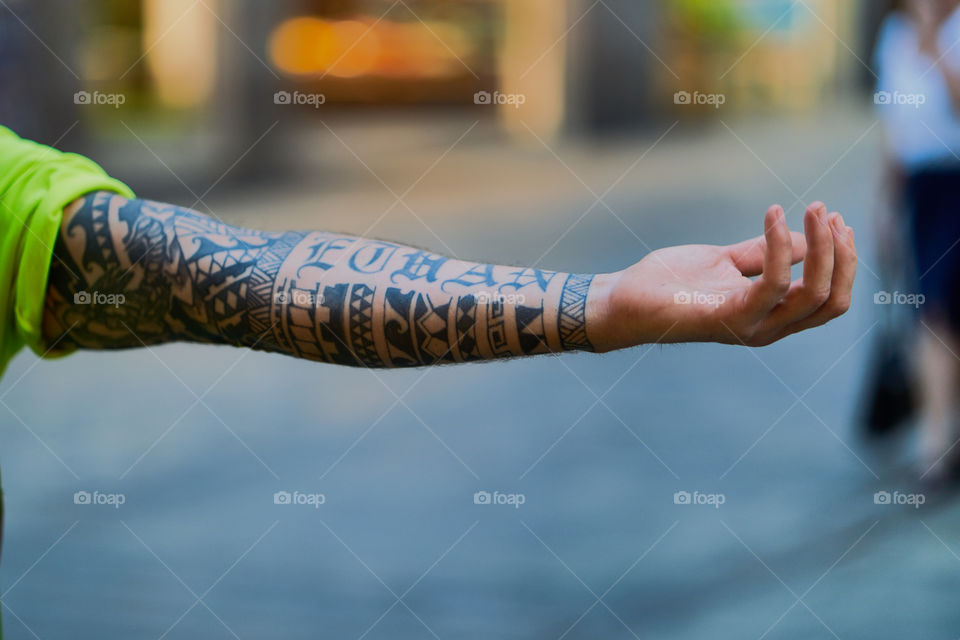 Arm full of tattoos