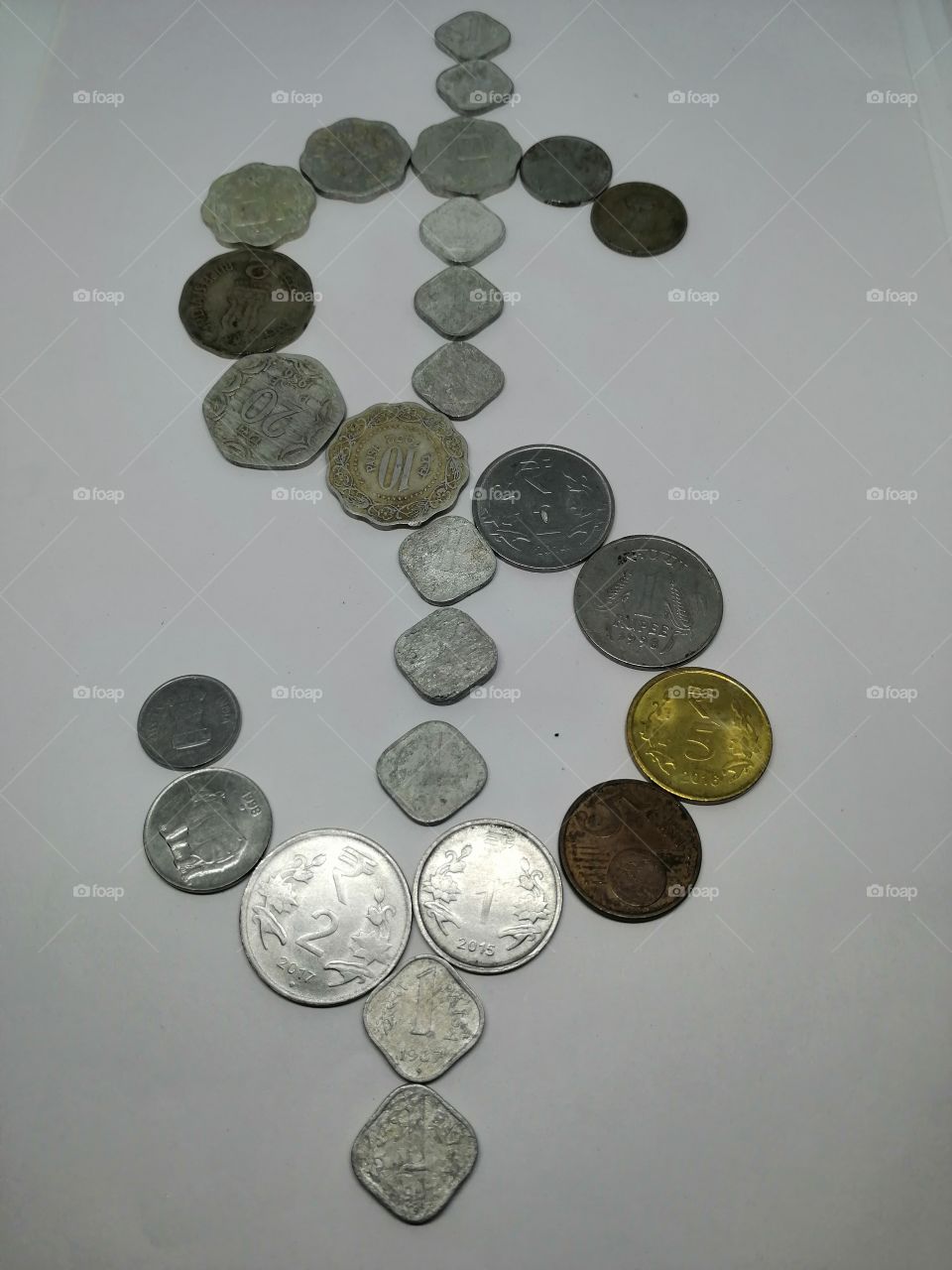 American Dollar shape coins.
My Hobby to collect ancient conis.