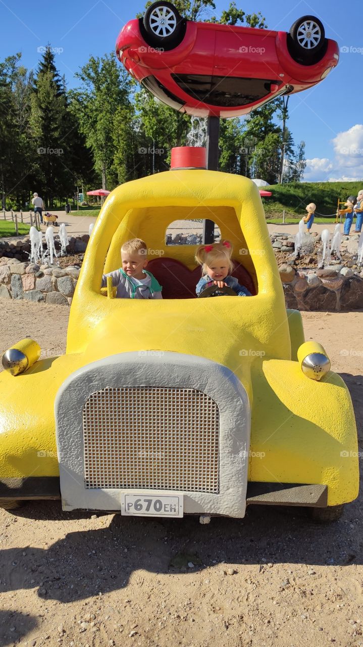 Kids in a toy car