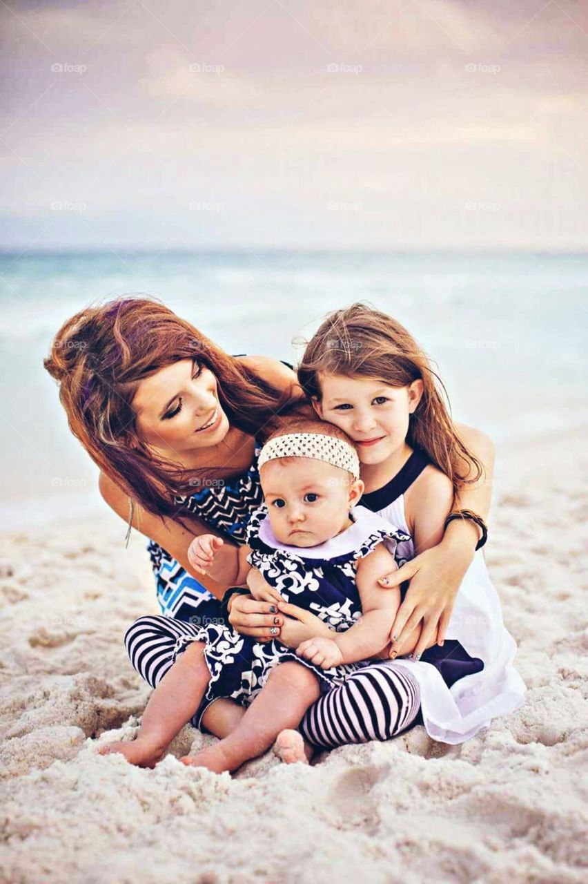 Mother & Daughters On The Beach