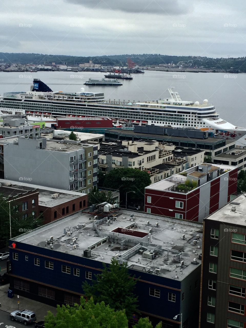 Cruise ship at port to pick up passengers.