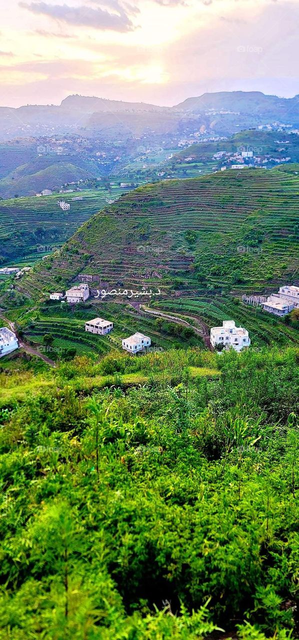 Glory be to God, the magnificent and picturesque view and the natural green trees are a view that is nothing more wonderful than it