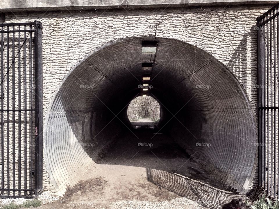 A concrete pedestrian tunnel near the historic Gunpowder Trail. 