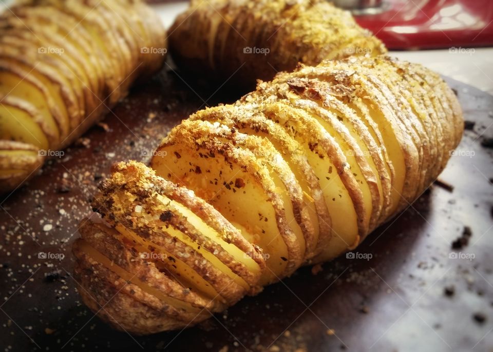 Hasselback Potatoes sliced cooked and ready to eat hot out of the oven