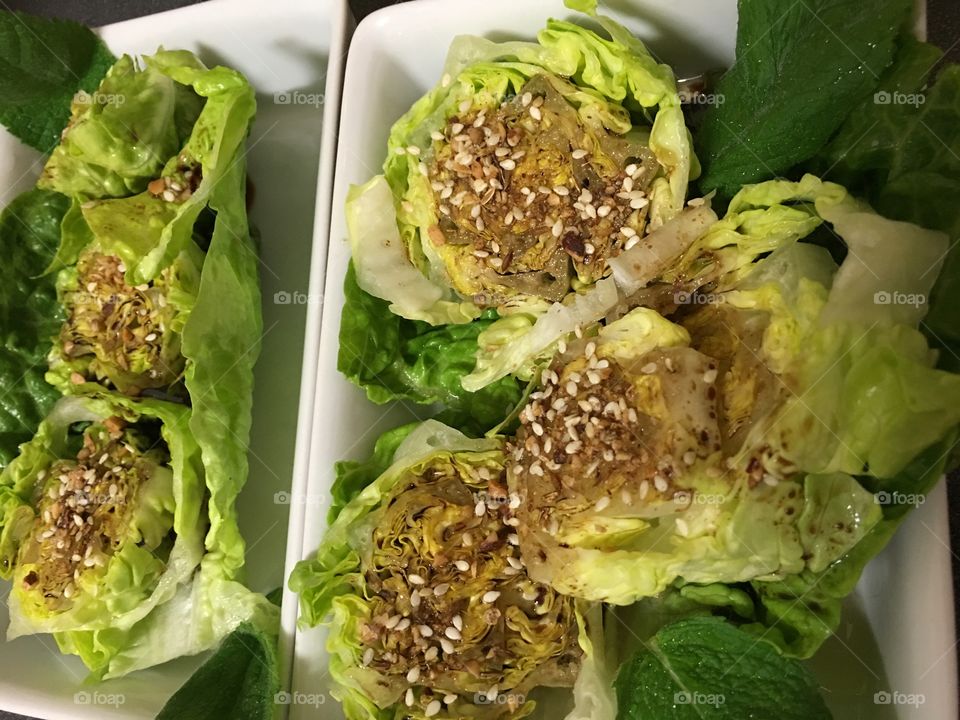 Fresh, tasty, low calorie and healthy side salad featuring baby berg lettuce cut into rounds and soaked in balsamic vinaigrette and topped with dukkah