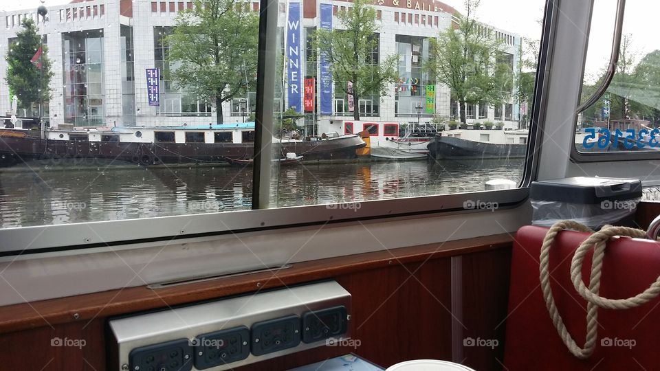 by boat in Amsterdam