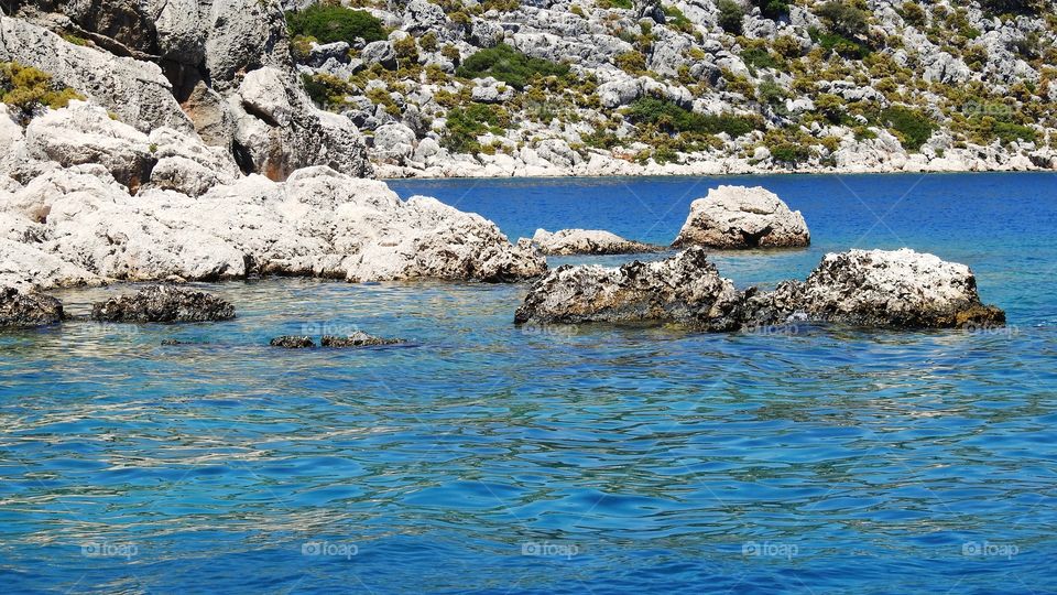 Kekova region (Turkey): Kekova island (Goat island), Oludeniz Strait (Blue lagoon) between it and the mainland, the mainland coast opposite Kekova island, and a number of small Islands nearby.