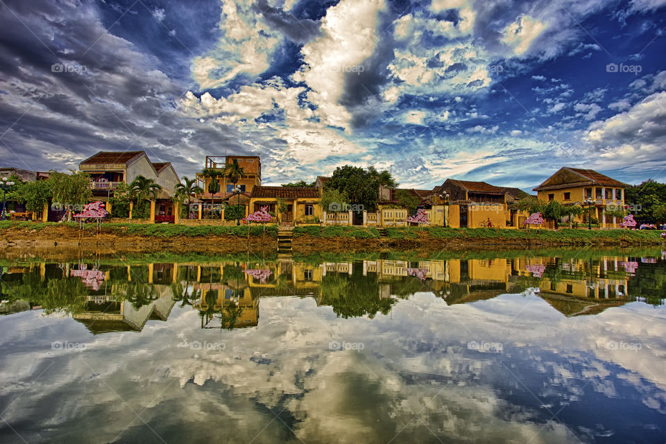 picturesque landscape of Hoi An old town in central Vietnam part of UNESCO world heritage. Old house reflection on Han river