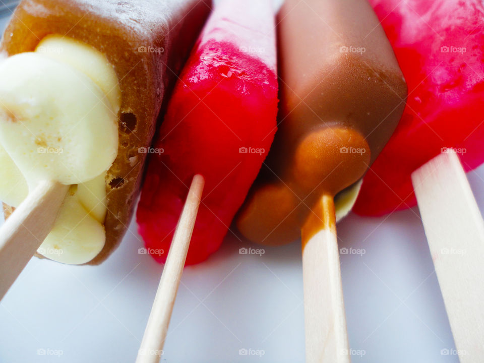 Close-up of various ice lollies