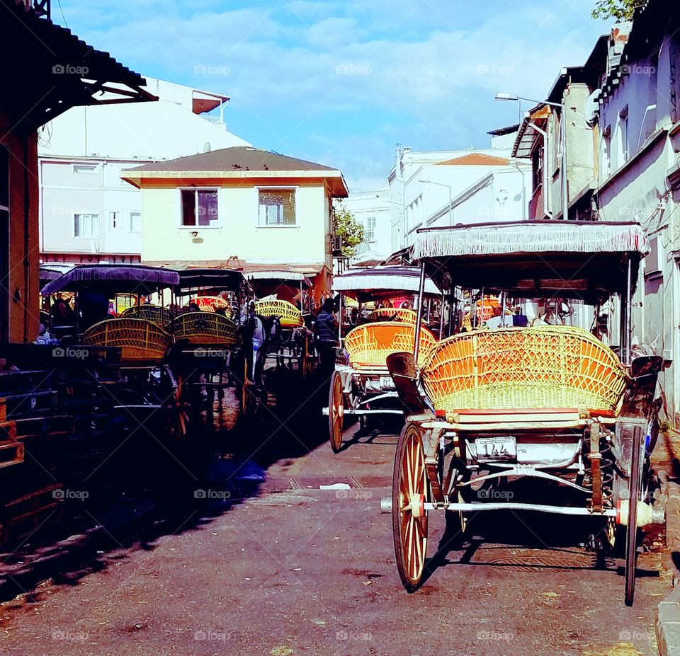 an Alleyway in Büyük Ada island across from Istanbul Turkey littered with horse drawn carriages