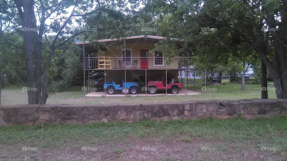 blue red twin jeeps. these jeeps take us to the river to fish